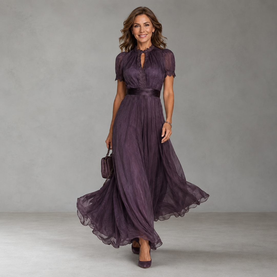 Emma & Rose Cape Town Kelly maxi dress in flowing fabric with a fitted bodice and wide straps, perfect for summer wear.