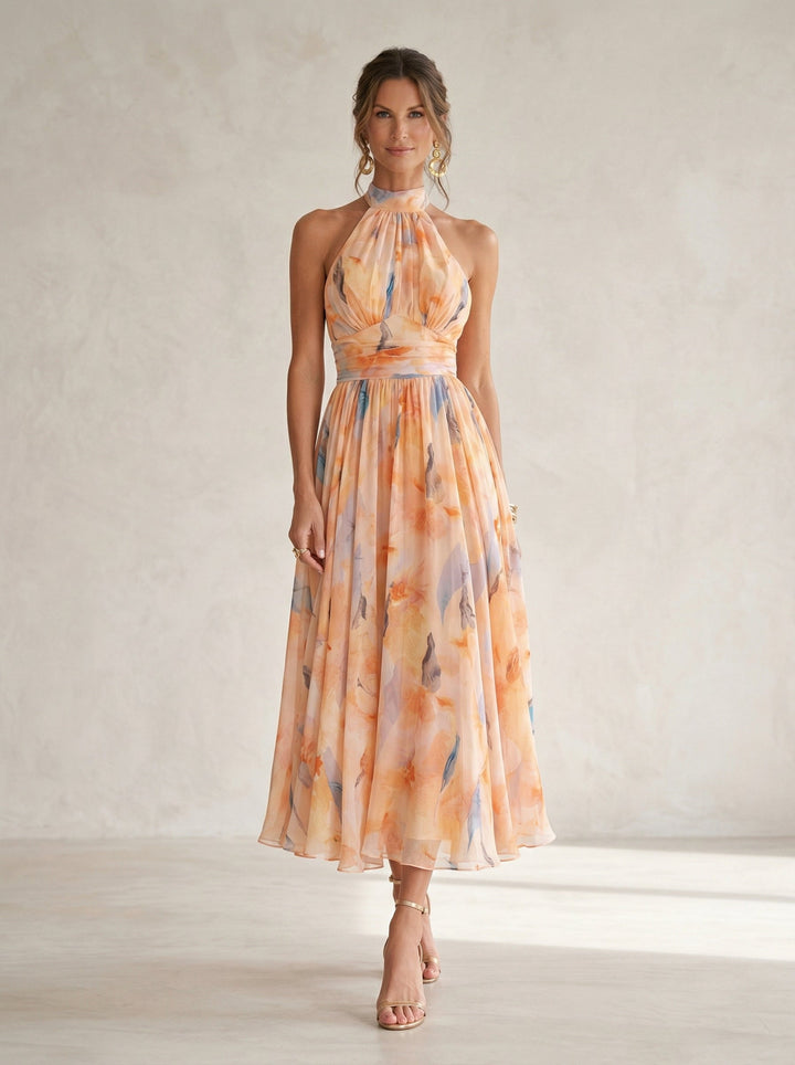 Emma & Rose Cape Town Esther™ halter neck dress with watercolor print, showcasing a stylish and vibrant summer dress design.