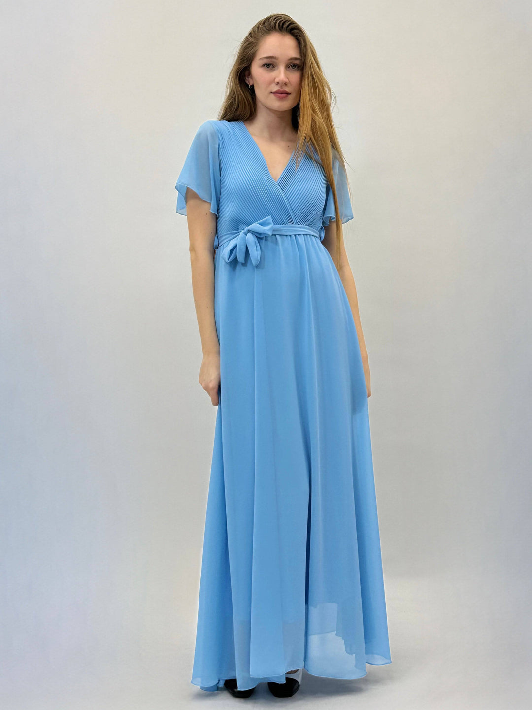 Flowing Margot™ dress by Emma & Rose Cape Town, lightweight fabric, elegant design, and flowing silhouette perfect for summer wear.