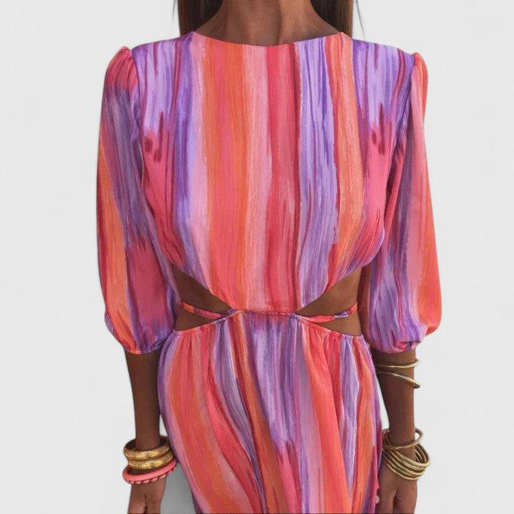 Olyzzanna™ elegant backless tie-dye maxi dress by Emma & Rose Cape Town, featuring halter neckline and long flowing skirt.