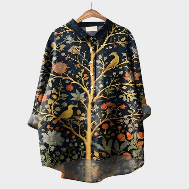 Elegant Nola™ blouse by Emma & Rose Cape Town, featuring a stylish design with soft fabric and detailed neckline.