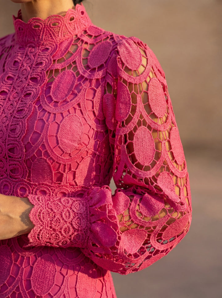 Close-up of Emma & Rose Cape Town Carmona Spring Lace Dress showing intricate lace fabric and delicate stitching details.