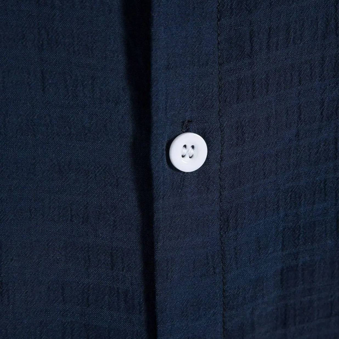 Emma & Rose Manhattan Rio™ summer shirt, lightweight fabric with a relaxed fit and stylish design, displayed on a hanger.