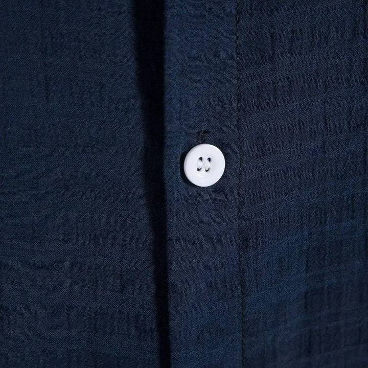 Emma & Rose Manhattan Rio™ summer shirt, lightweight fabric with a relaxed fit and stylish design, displayed on a hanger.