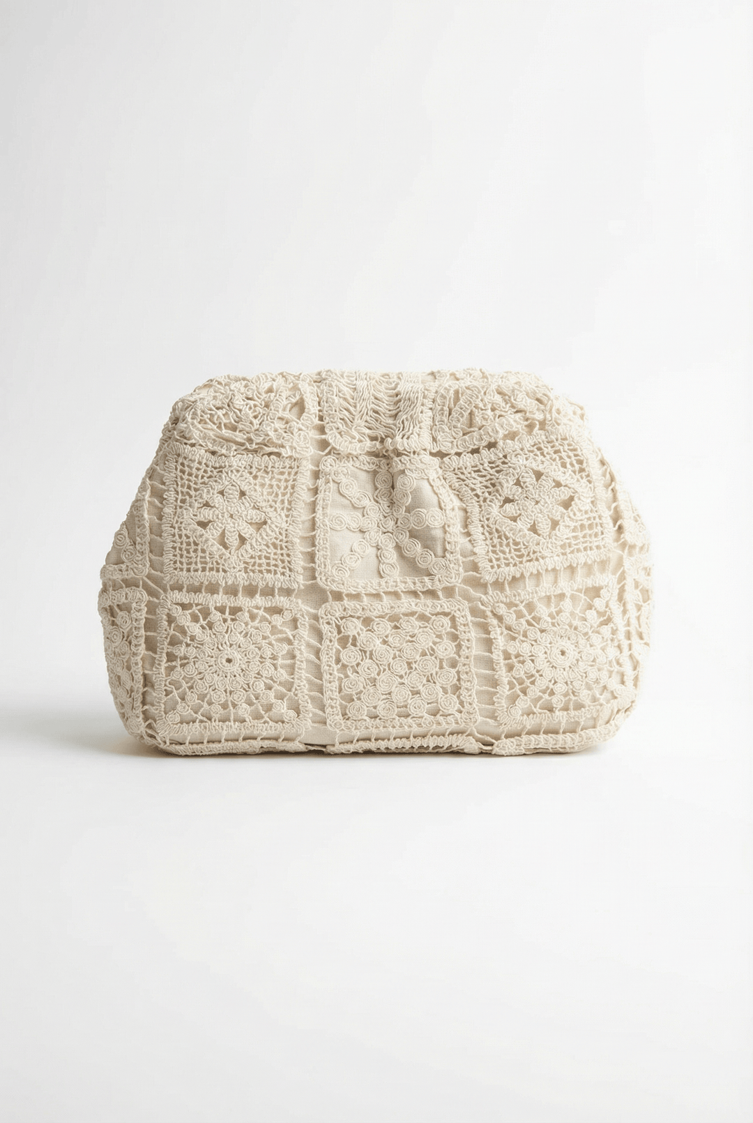 Ophelia™ lace clutch bag by Emma & Rose Cape Town, structured and elegant with romantic lace design, on a white background.