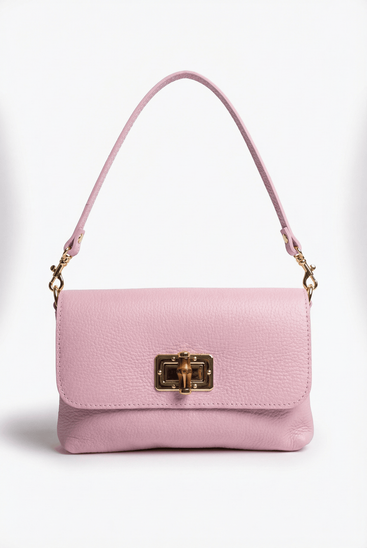 Emma & Rose Cape Town Rozanne™ leather shoulder bag with structured design and shoulder closure on a white background.