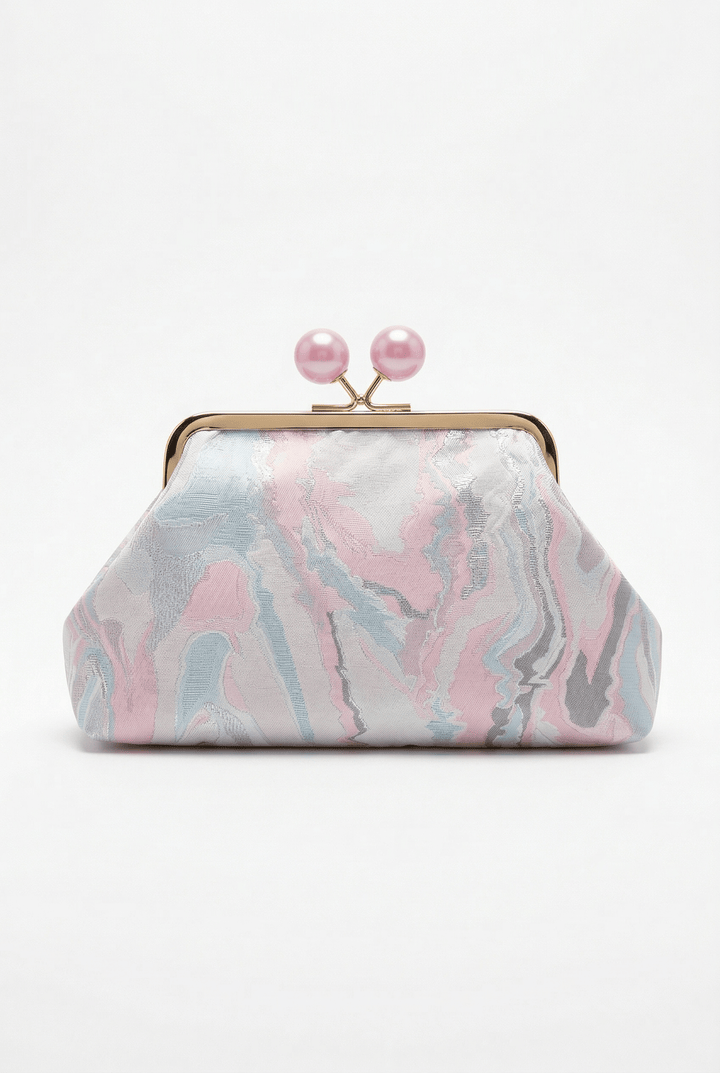 Emma & Rose Cape Town Simone™ elegant clutch bag with structured design and gold-tone clasp, standing upright on a white background.