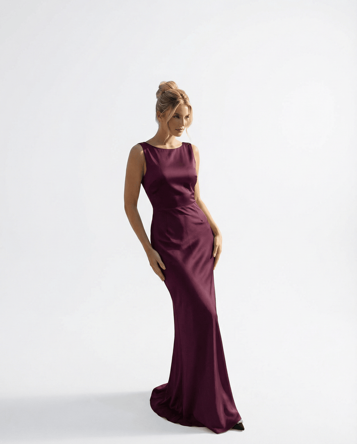 Elegant Karla™ long backless dress by Emma & Rose Cape Town, designed for ceremonies, shown in a flowing, stylish fabric.