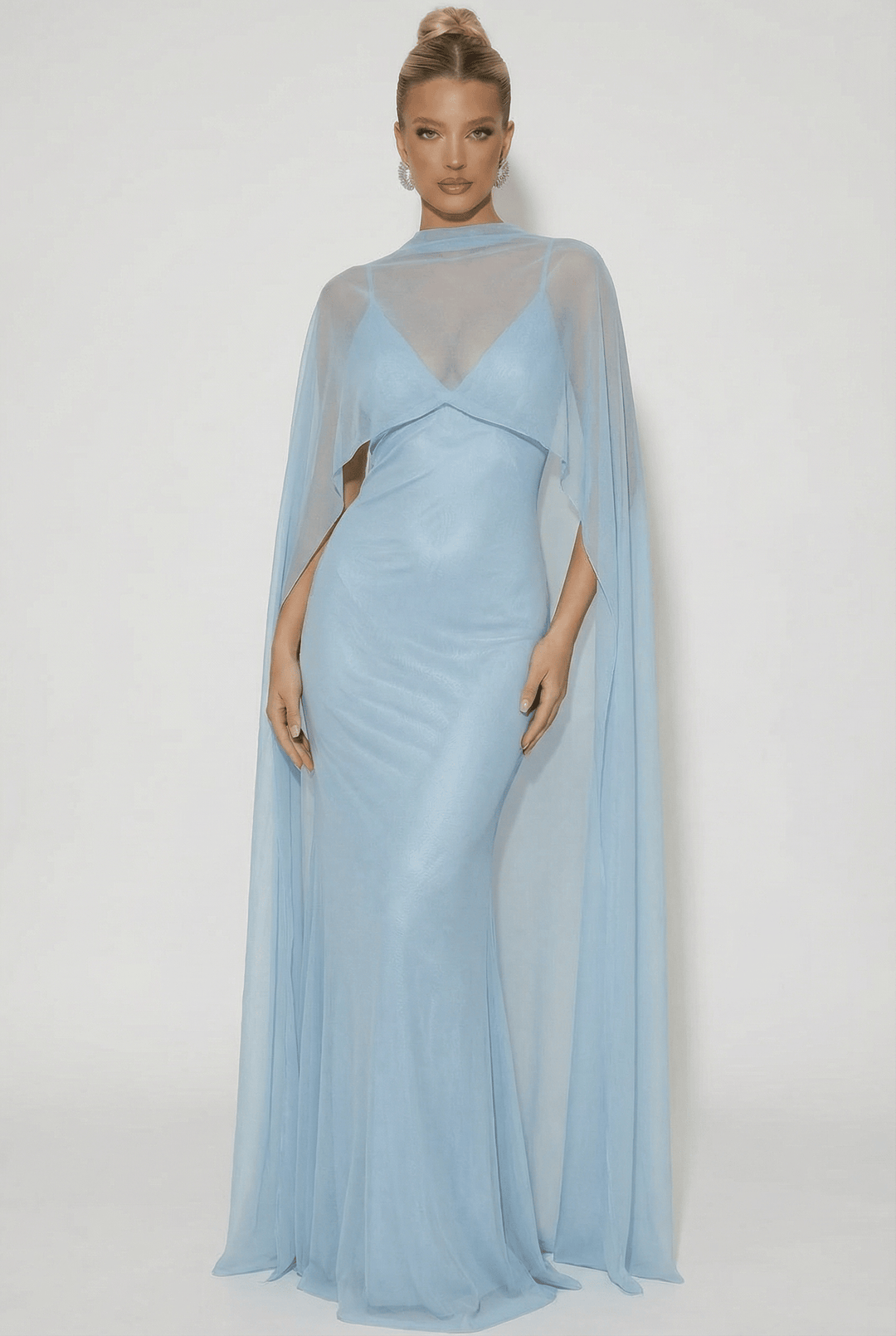 Heleen™ long dress by Emma & Rose Cape Town featuring soft, luxurious fabrics and an elegant cape detail.
