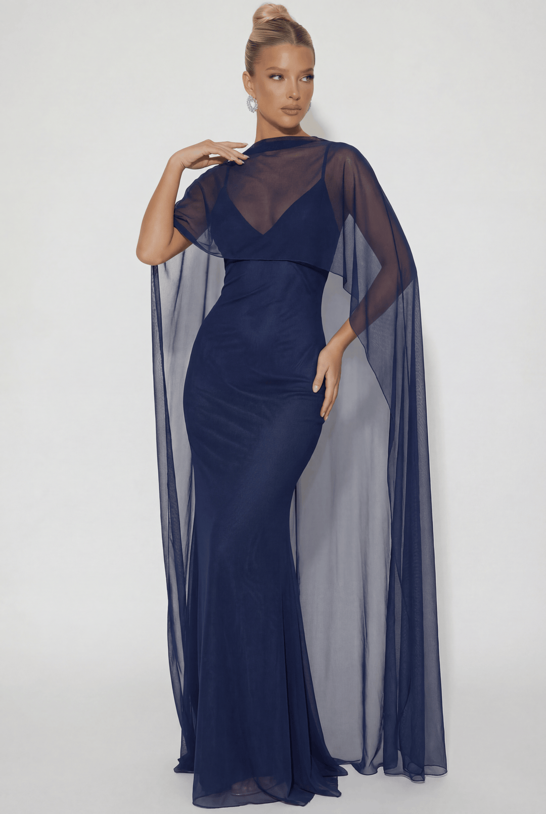 Heleen™ long dress by Emma & Rose Cape Town featuring soft, luxurious fabrics and an elegant cape detail.