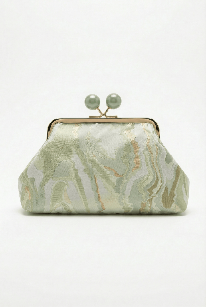 Emma & Rose Cape Town Simone™ elegant clutch bag with stylish closure, showcasing a sleek, sophisticated design.
