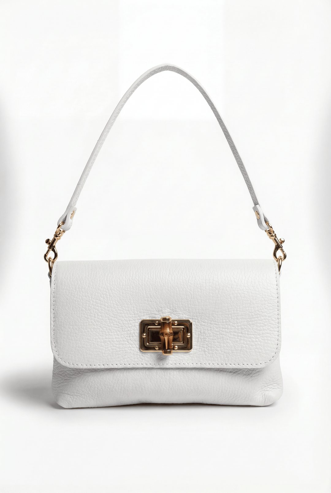 Emma & Rose Cape Town Rozanne™ leather shoulder bag with secure closure, stylish genuine leather design, and versatile handbag style.