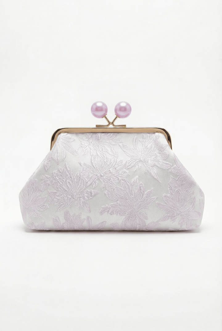 Emma & Rose Cape Town Simone™ elegant clutch bag with sophisticated closure, showcasing sleek design and luxurious craftsmanship.