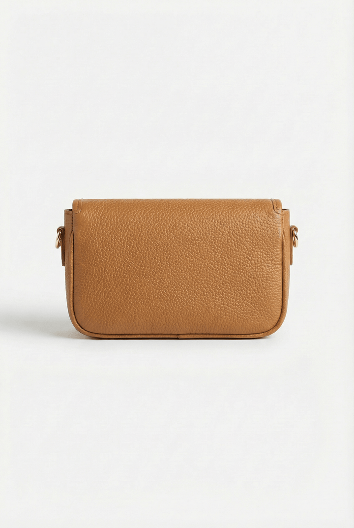 Emma & Rose Cape Town Phaedra™ compact crossbody bag with buckle details, stylish black borse with adjustable strap.