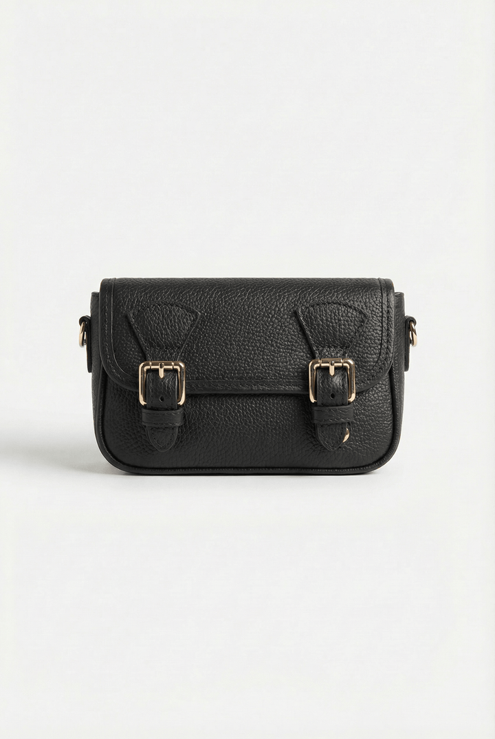 Emma & Rose Cape Town Phaedra™ compact crossbody bag with buckle details, stylish black borse featuring a sleek design.