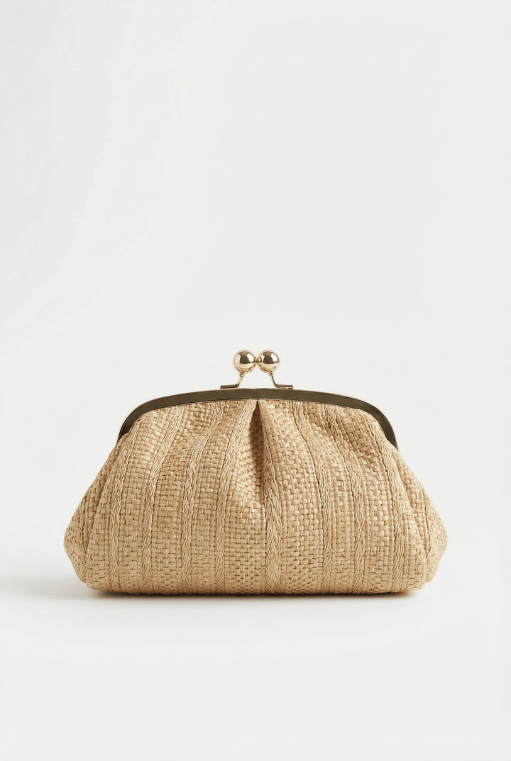 Emma & Rose Cape Town Mieke™ soft clutch bag with secure closure, stylish design, and smooth fabric in natural light.