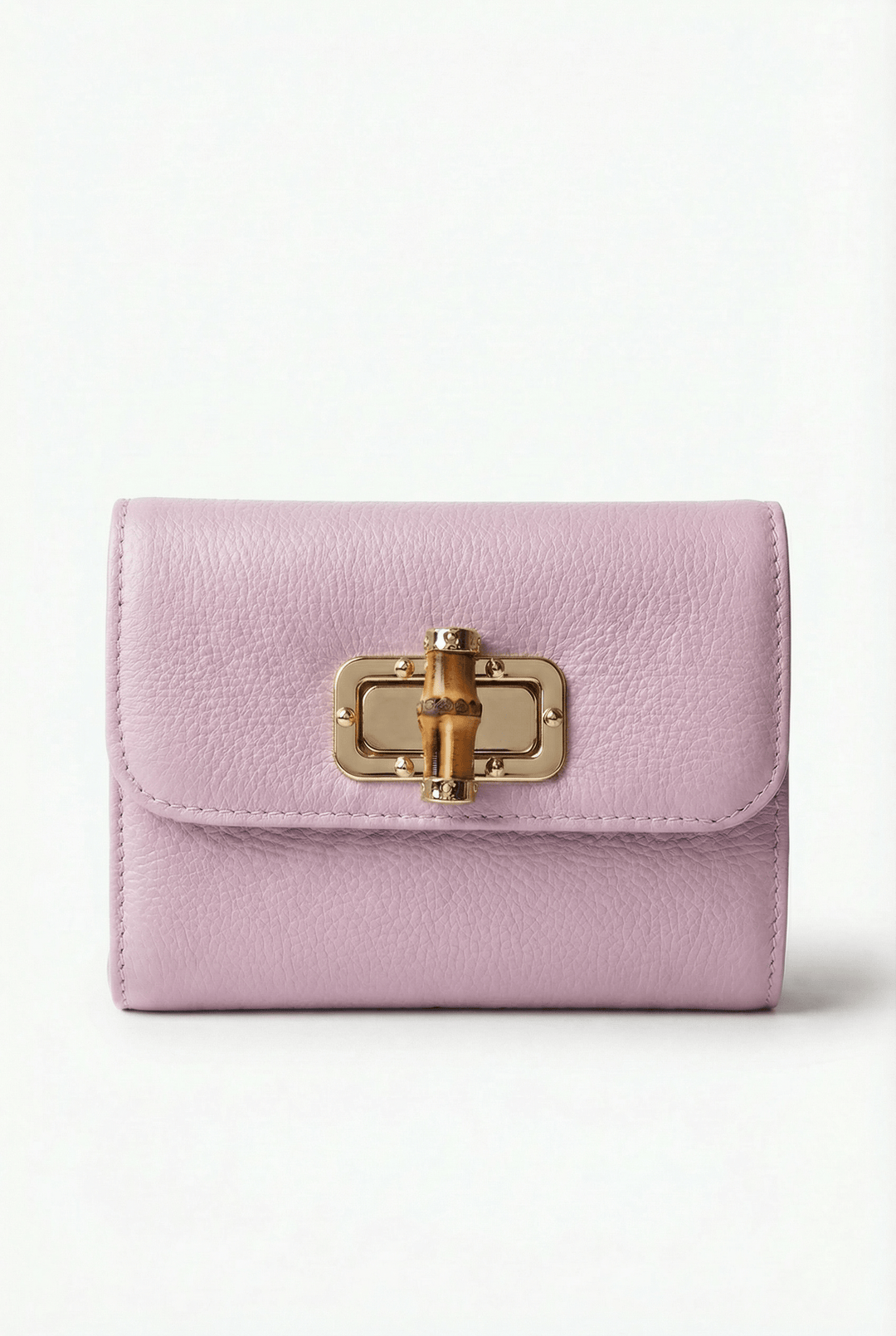 Elegant Emma & Rose Cape Town Heleen™ leather pouch with a stylish closure, showcasing its sleek design and high-quality leather.
