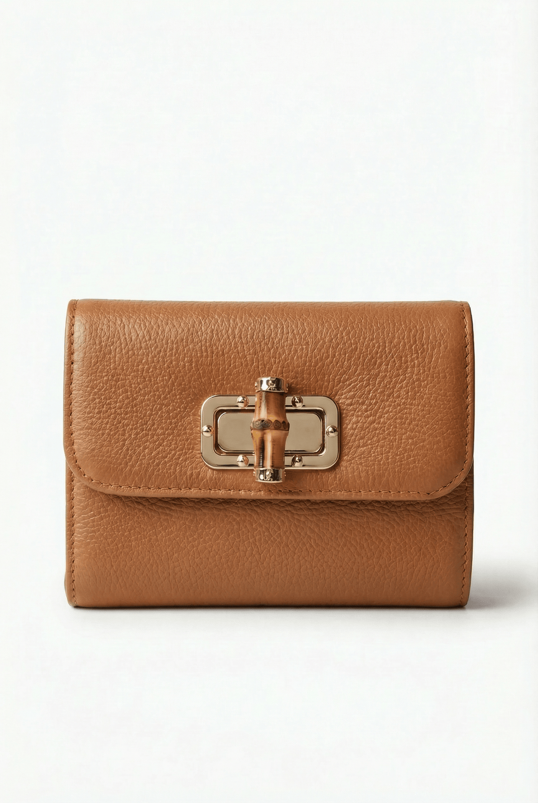 Heleen™ elegant leather pouch with stylish closure, crafted by Emma & Rose Cape Town, showcasing smooth leather and refined design.