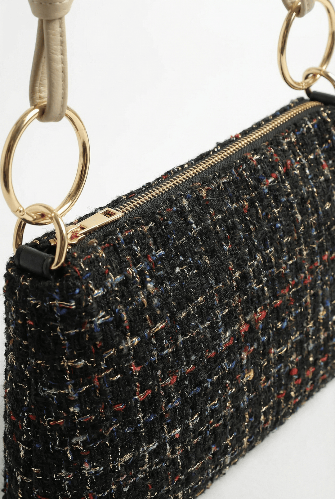 Jacoba™ Emma & Rose Bouclé fabric handbag with stylish handles and detailed stitching, showcasing elegant design and craftsmanship.