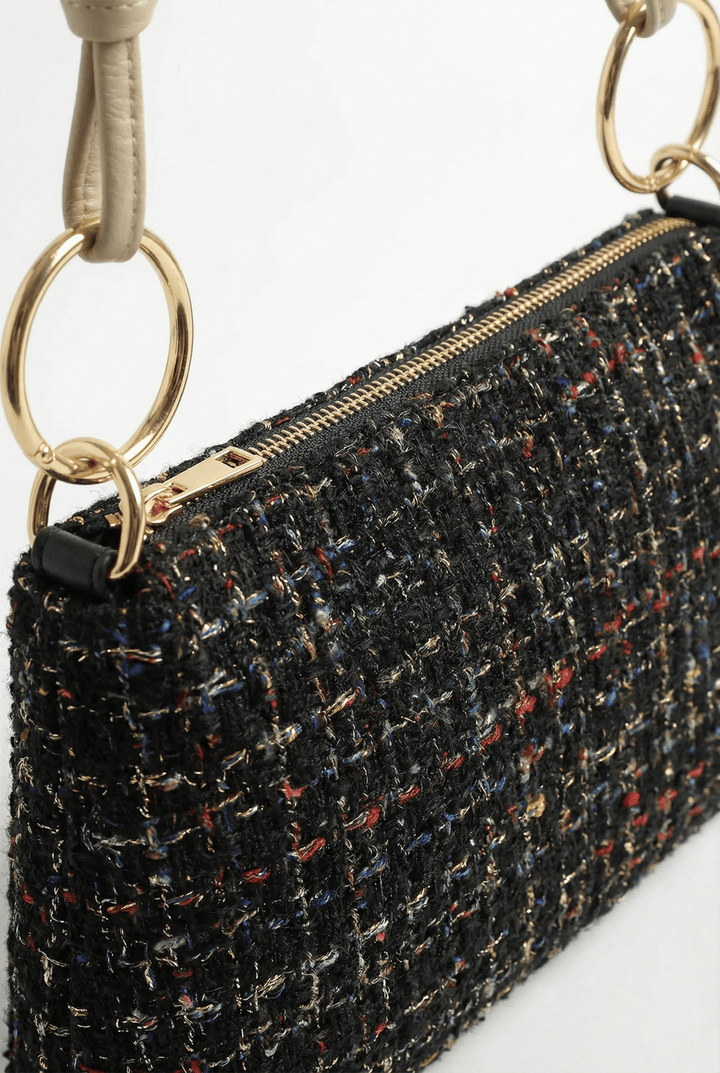 Jacoba™ Emma & Rose Bouclé fabric handbag with stylish handles and detailed stitching, showcasing elegant design and craftsmanship.