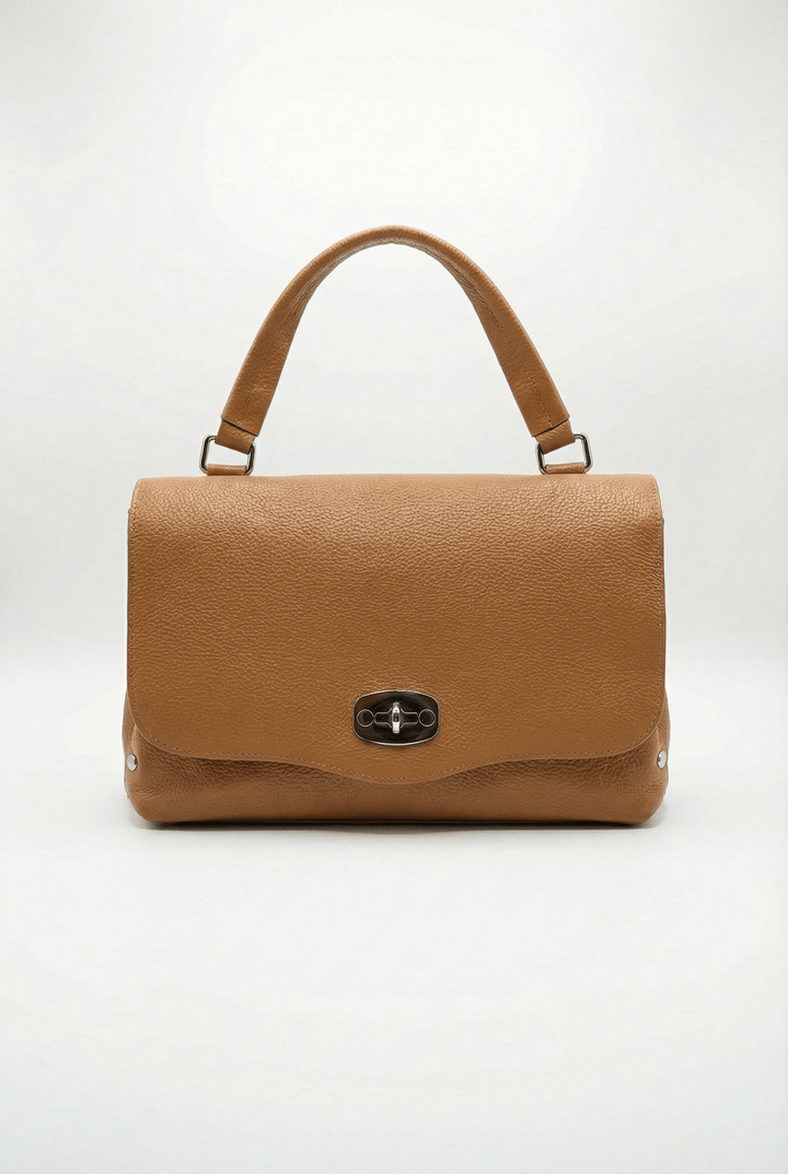 Gretchen Emma & Rose Cape Town genuine leather handheld borsa with closure, stylish and crafted from high-quality leather.