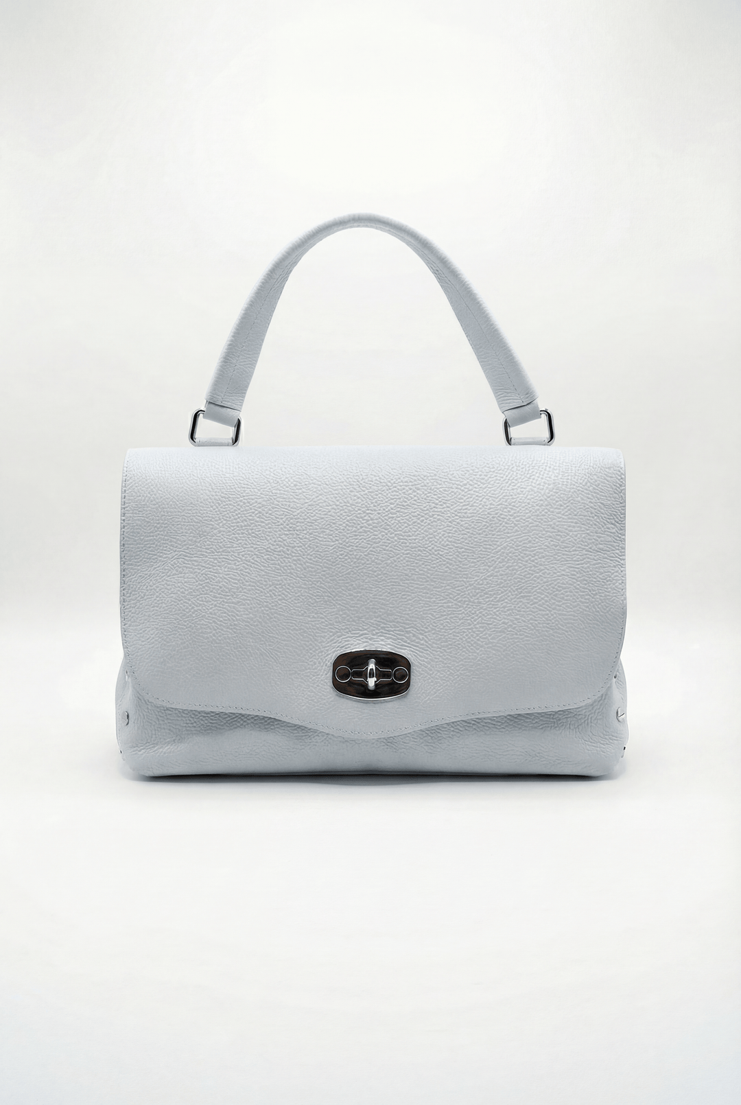 Emma & Rose Cape Town Gretchen genuine leather handheld bag with closure, featuring a sleek, structured design and top handle.