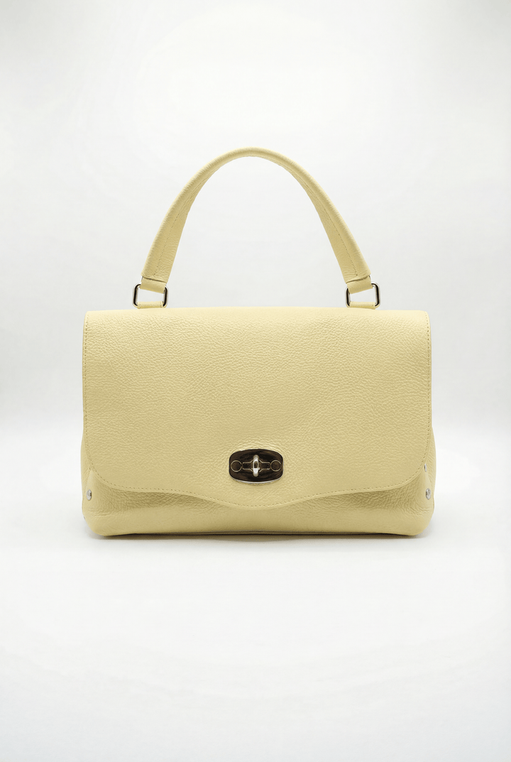 Gretchen™ Emma & Rose Cape Town genuine leather handheld bag with closure, featuring a sleek, stylish design and high-quality craftsmanship.