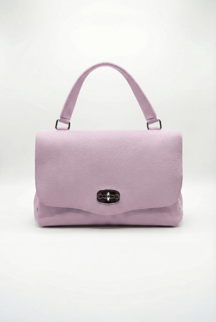 Gretchen Emma & Rose Cape Town genuine leather handheld bag with closure, showcasing smooth leather and elegant design.