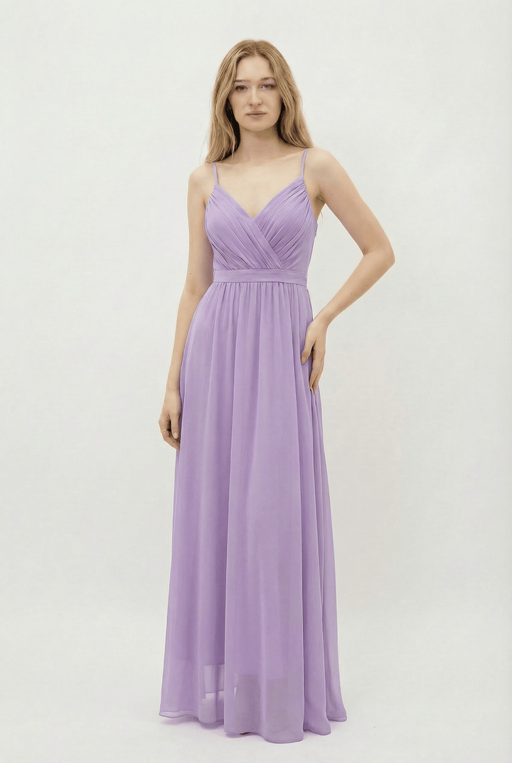 Gisella™ flowing dress by Emma & Rose Cape Town, lightweight abiti with elegant drape and soft fabric, displayed on a hanger.