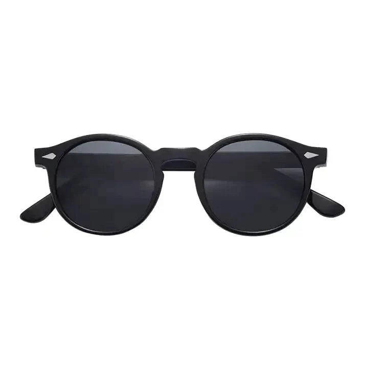 Skyler™ tinted sunglasses by Emma & Rose Manhattan with round frames and UV-protective lenses, stylish and timeless eyewear.
