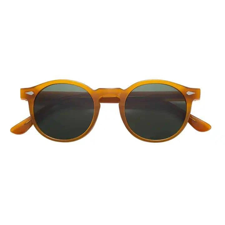 Emma & Rose Manhattan Skyler™ tinted sunglasses with round frames and gradient lenses, stylish and timeless for sun protection.