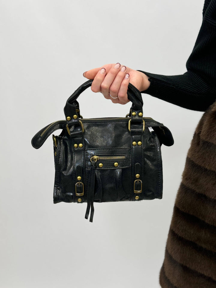 Genuine leather Lize™ handbag by Emma & Rose Cape Town, stylish borse with sleek design and top handle, in natural leather color.