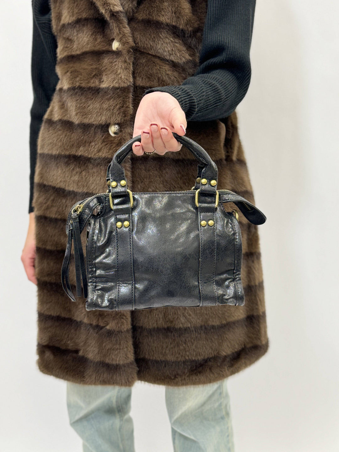 Emma & Rose Cape Town Lize™ genuine leather handbag with top handle and gold accents, displayed on a neutral background.