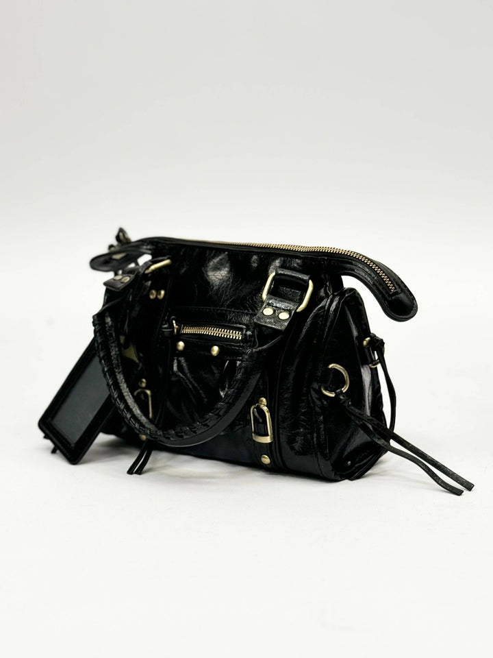 Genuine leather Lize™ handbag by Emma & Rose Cape Town with sleek design and top handle, shown in natural tan color.
