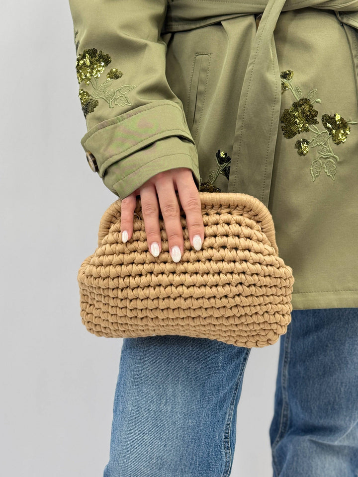 Emma & Rose Cape Town Fleur™ crochet bag with artisan craftsmanship, featuring a stylish design and natural woven texture.