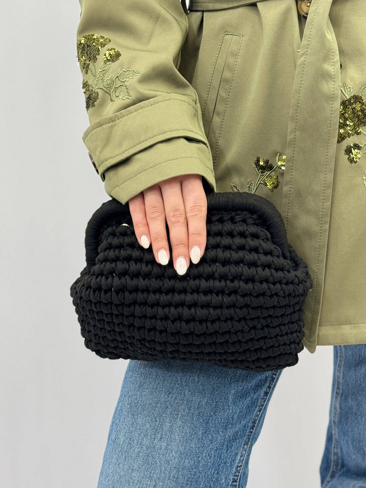 Emma & Rose Cape Town Fleur™ crochet bag with artisan craftsmanship, showcasing intricate handwoven details and natural fiber texture.
