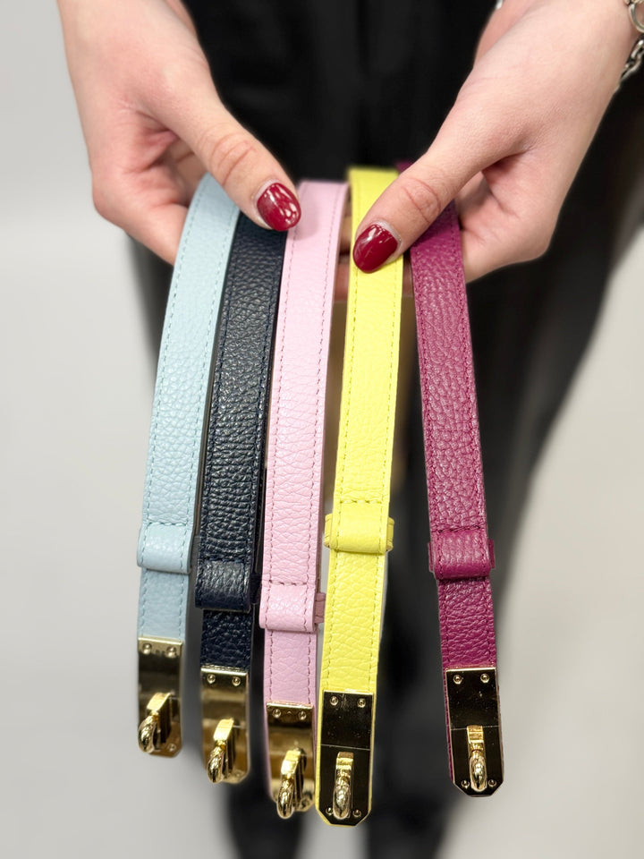 Emma & Rose Cape Town Kees™ genuine leather belt buckle, shiny metal accessory with detailed engraved design.