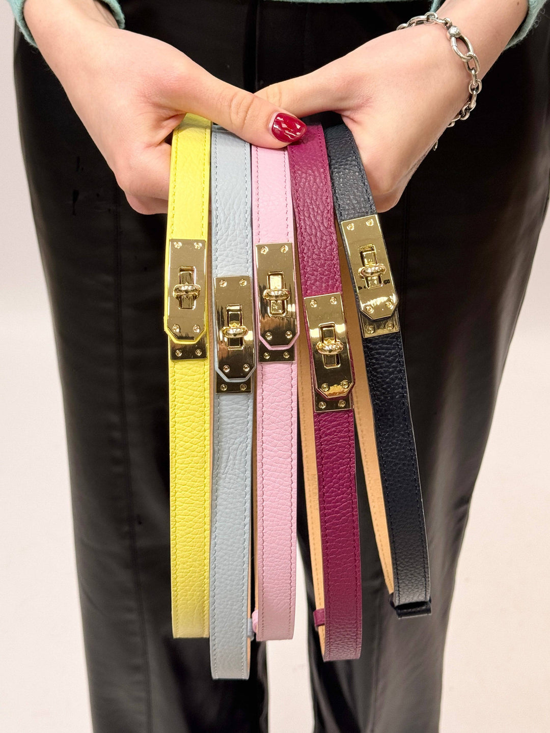 Emma & Rose Cape Town Kees™ genuine leather belt buckle, close-up of a polished metal accessory with engraved details.