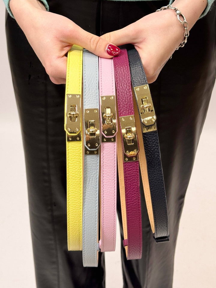 Emma & Rose Cape Town Kees™ genuine leather belt buckle, close-up of a polished metal accessory with engraved details.