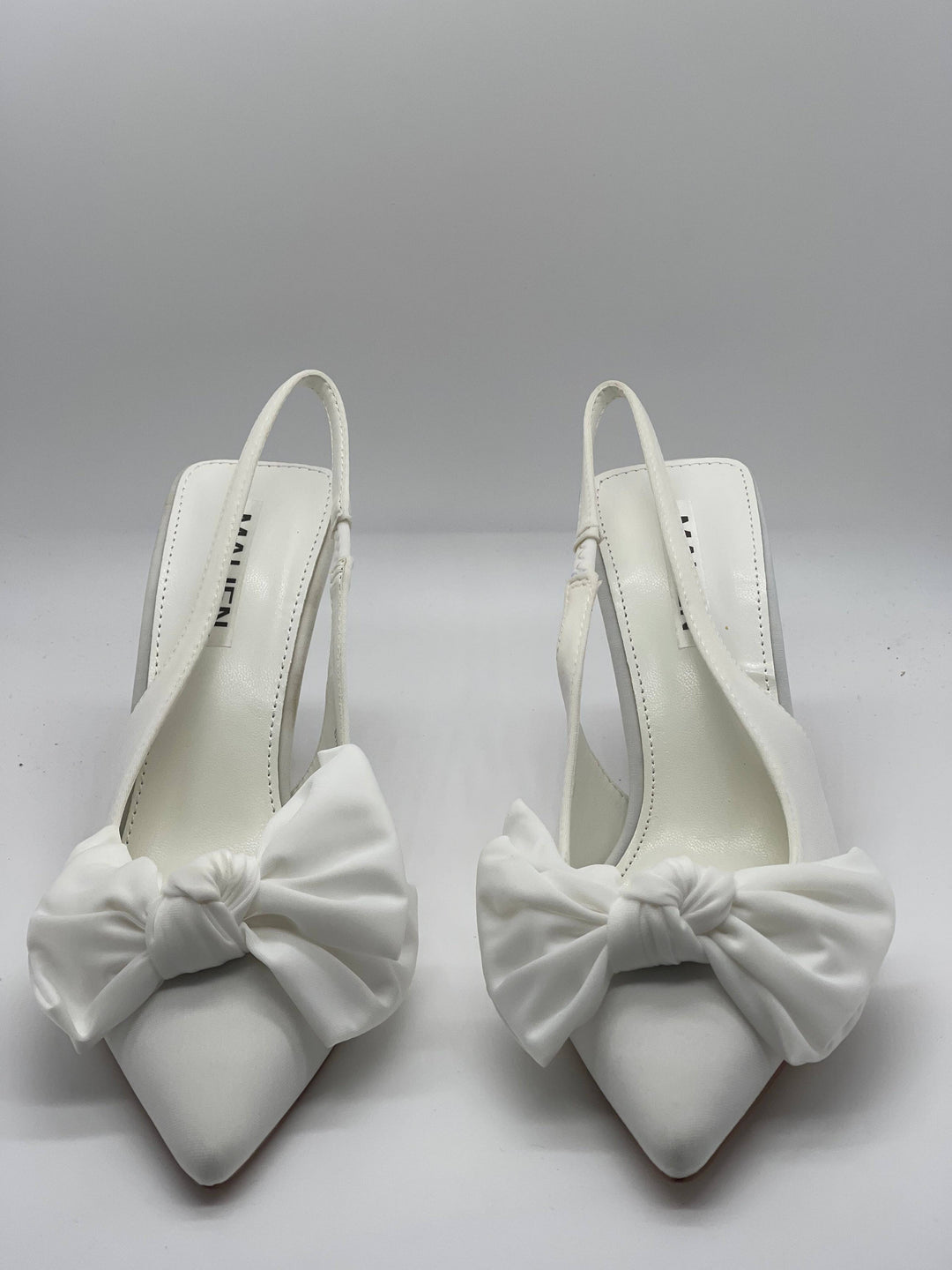 Emma & Rose Cape Town Talita™ slingback bow shoes, stylish black footwear with elegant bow detail, perfect for casual or dressy wear.