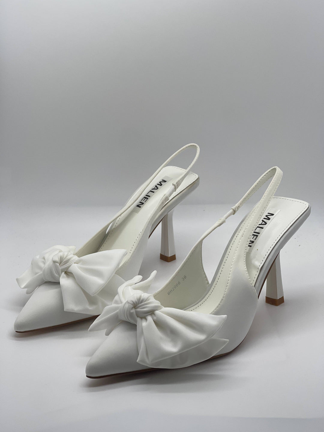 Emma & Rose Cape Town Talita™ slingback bow shoes with pointed toe and elegant design, displayed on a neutral background.