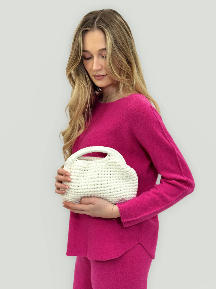 Emma & Rose Cape Town Ingrid™ crochet bag featuring artisan Italian craftsmanship, showcasing woven design and natural fiber details.