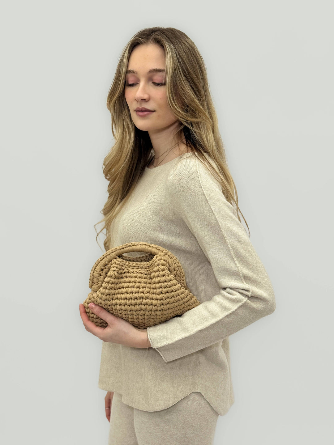 Emma & Rose Cape Town Ingrid™ crochet bag, artisan Italian design, natural woven bag with stylish handle and intricate crochet details.