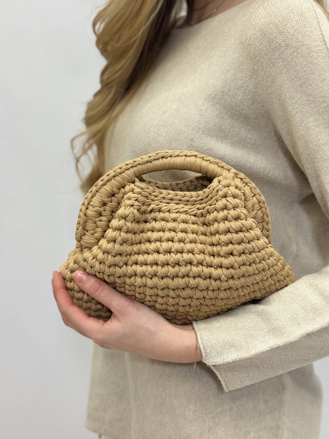 Emma & Rose Cape Town Ingrid™ crochet bag with artisan craftsmanship, showcasing woven design and natural materials.