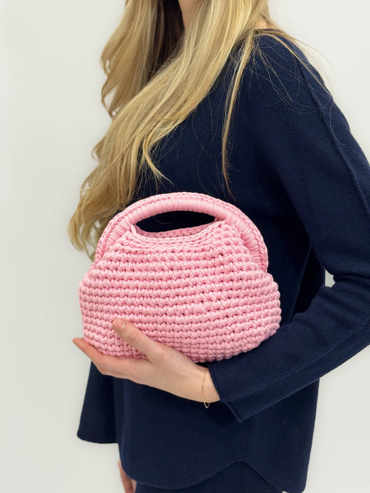 Emma & Rose Cape Town Ingrid™ crochet bag featuring handcrafted Italian crochet design with woven details and shoulder strap.