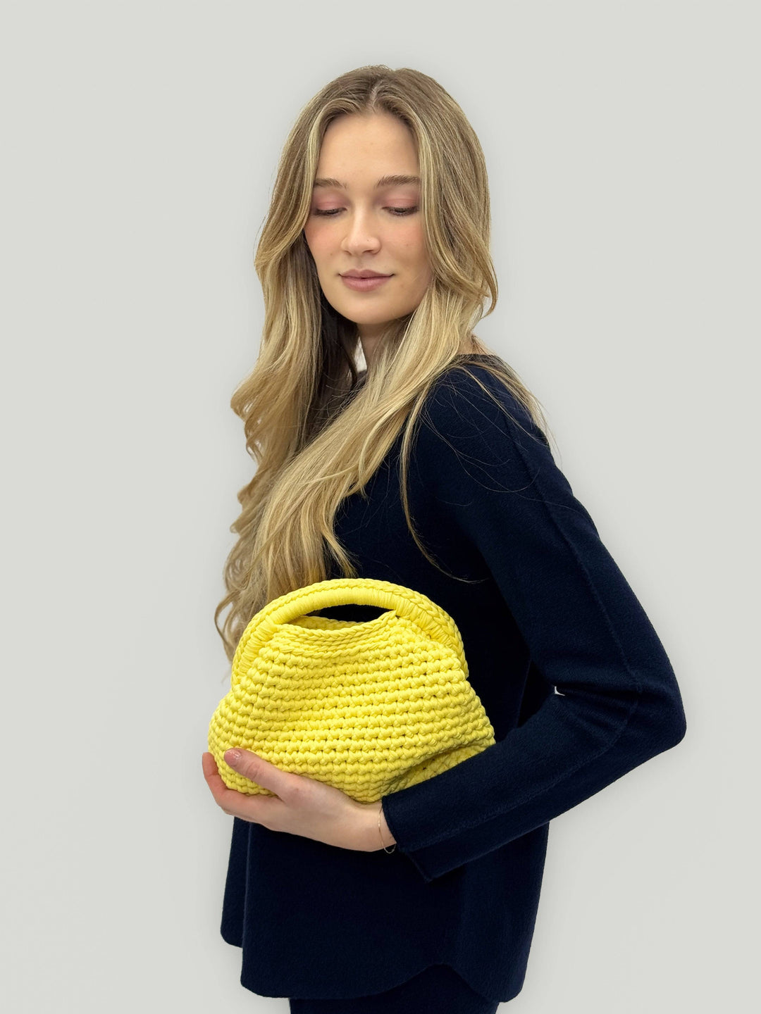 Emma & Rose Cape Town Ingrid™ crochet bag, artisan Italian boho-style tote with intricate crochet pattern and natural fibers.