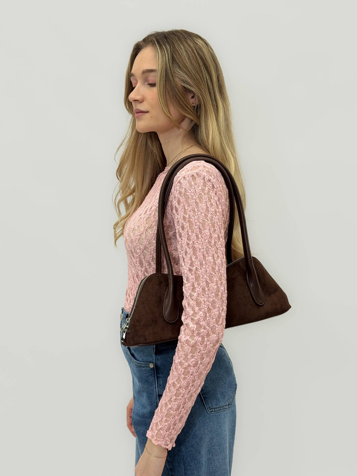 Emma & Rose Cape Town Carien™ women's faux leather bag with sleek design and structured shape, shown in the image.