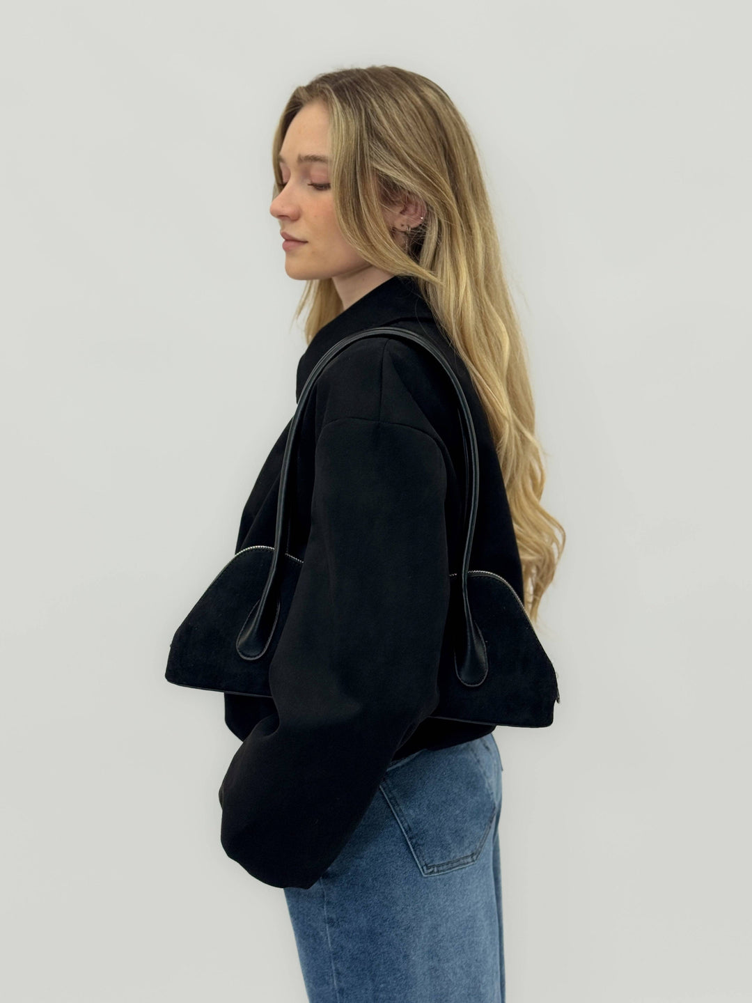 Carien™ women's faux leather bag by Emma & Rose Cape Town, stylish black leather model with sleek design and gold-tone accents.