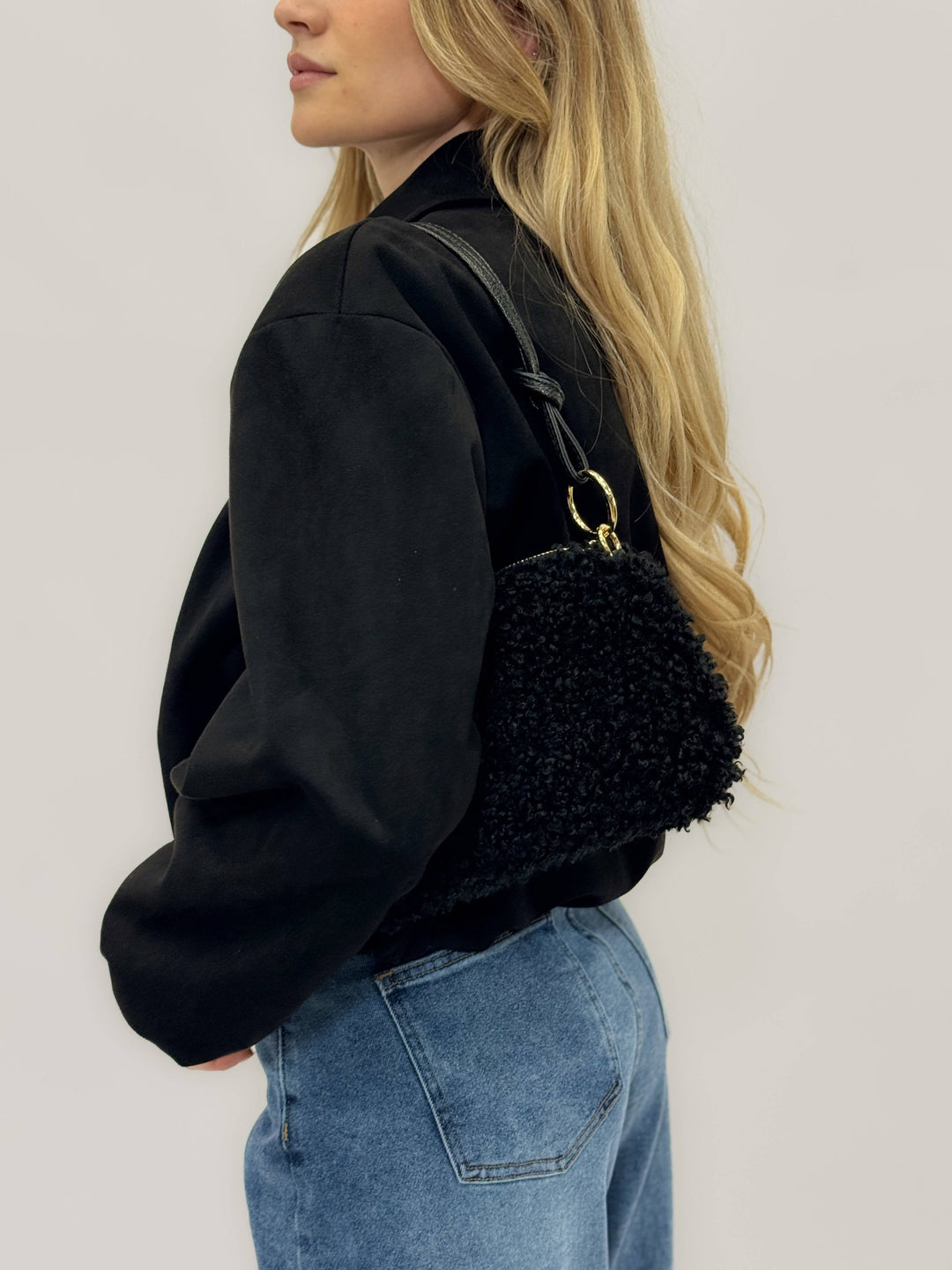 Emma & Rose Cape Town Carien™ women's faux leather bag with sleek design and detailed stitching, shown on a plain background.
