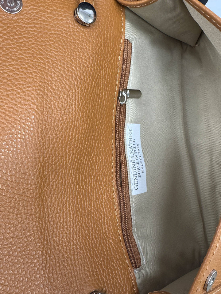 Anke™ Emma & Rose Cape Town genuine leather bag with elegant design, showcasing smooth leather and stylish handles.